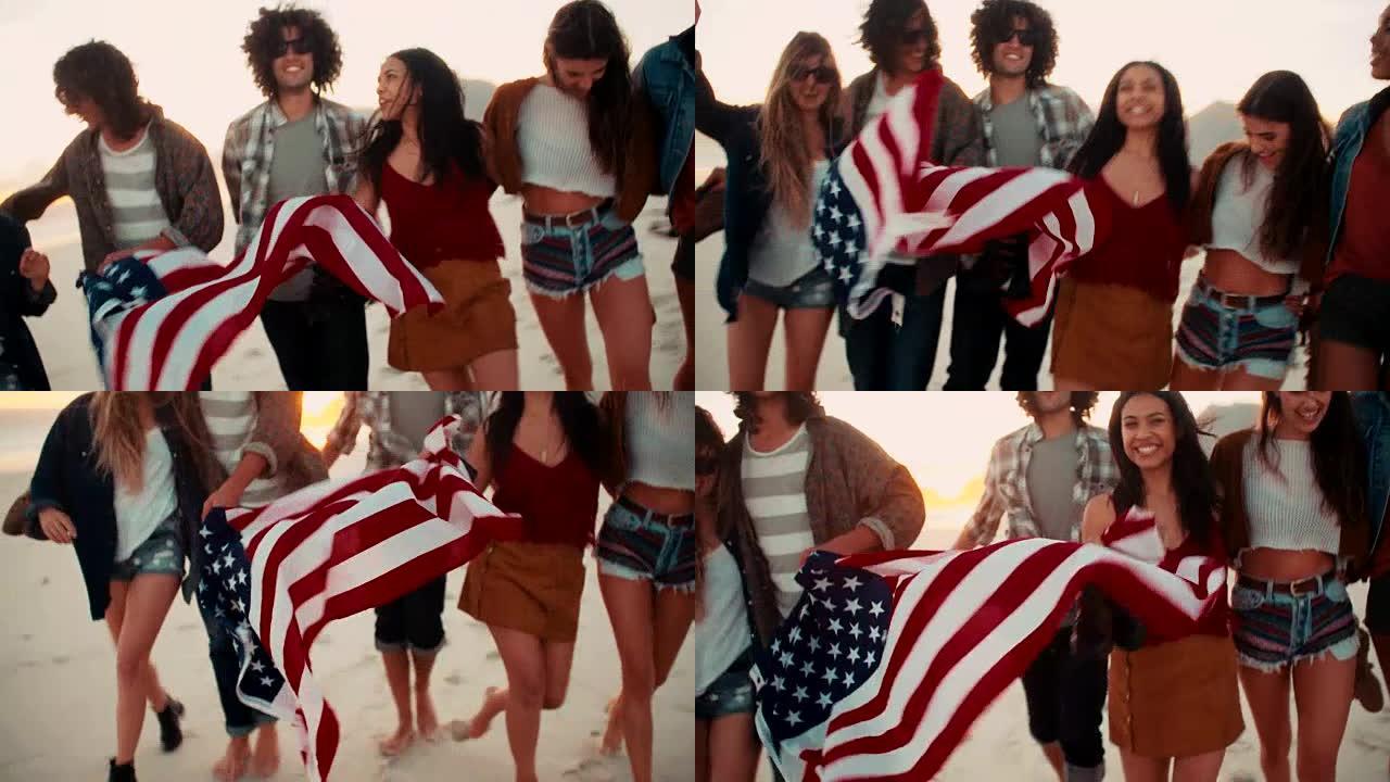 时髦的朋友手持美国国旗在海滩上散步