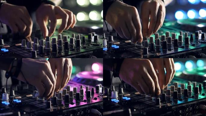 DJ在夜总会播放音乐。双手特写镜头。