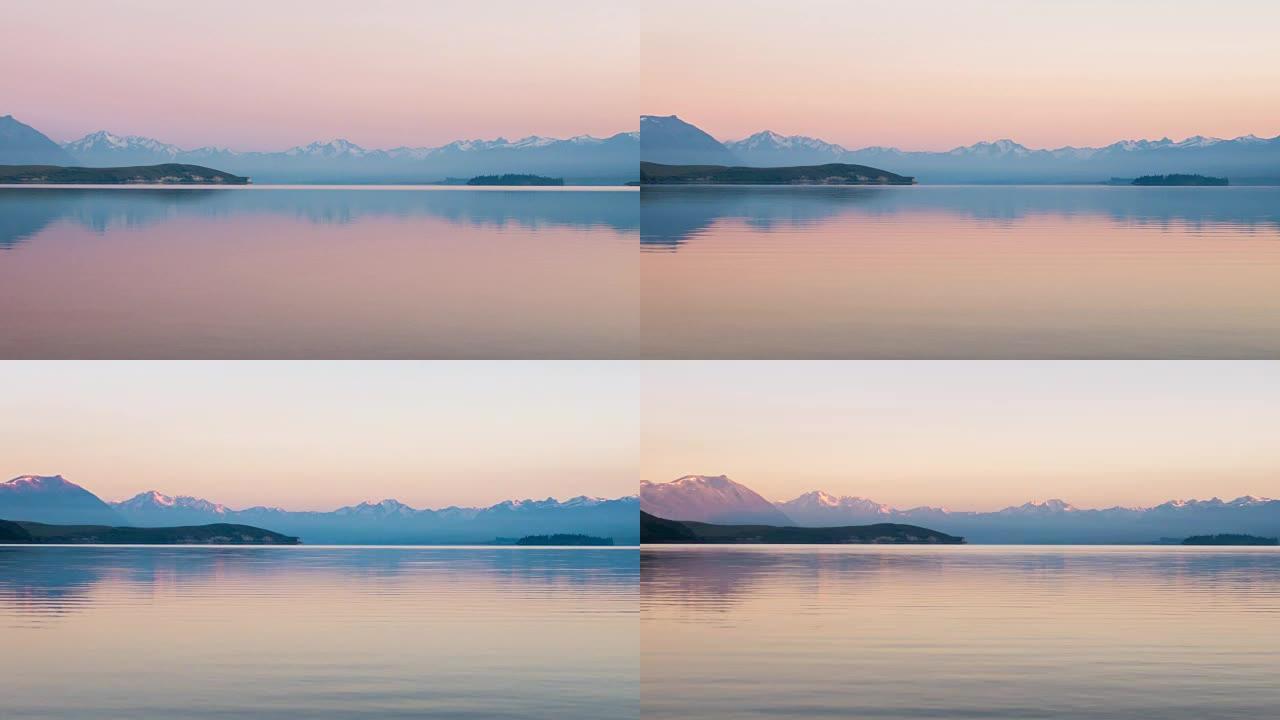 新西兰坎特伯雷日出时的特卡波湖风景，时间流逝，多莉从右向左拍摄