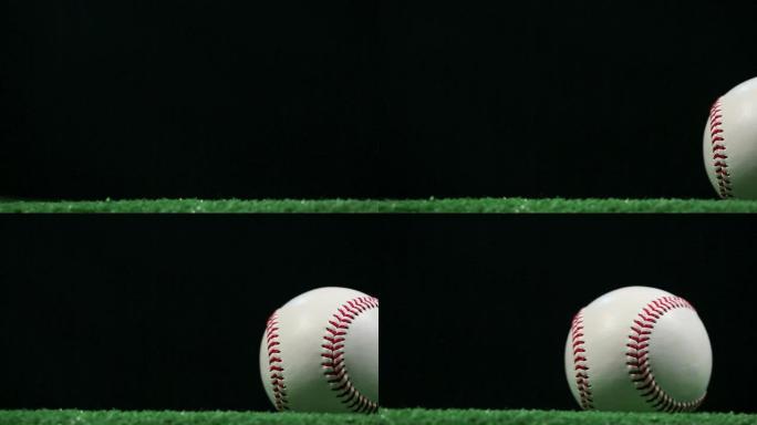 棒球盘地面上的棒球棒球特写绿色草地