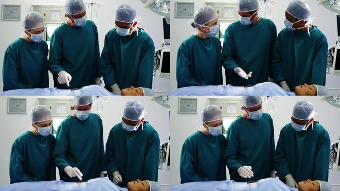 外科医生在手术室中相互交流
