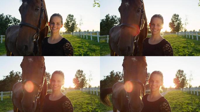 特写: 阳光明媚的日子里，强壮的棕色马和漂亮快乐的女孩的肖像