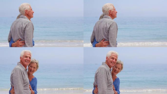 老夫妇面朝大海拥抱