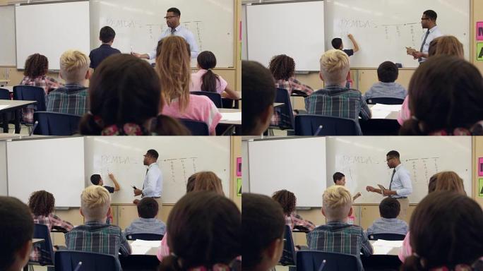 小学生在班级前的白板上写字，在R3D上拍摄
