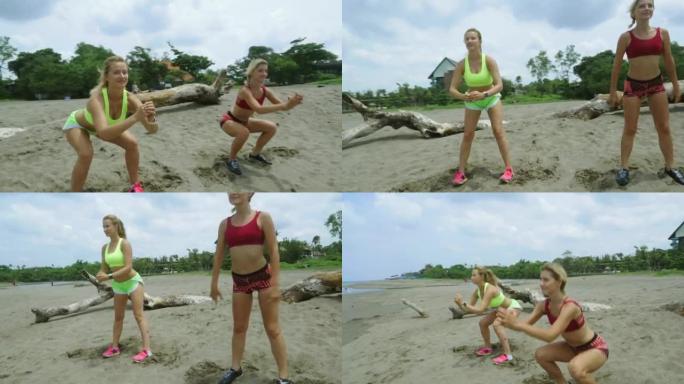 在海滩上表演下蹲的运动女性