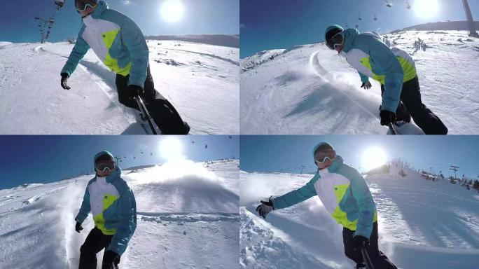 自拍照: 滑雪者在山区滑雪胜地骑粉雪