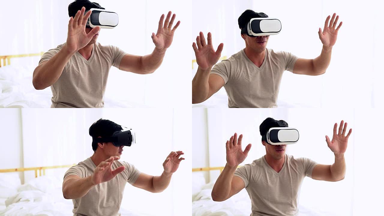 戴着虚拟现实眼镜的年轻人。与VR护目镜耳机一起使用的智能手机。