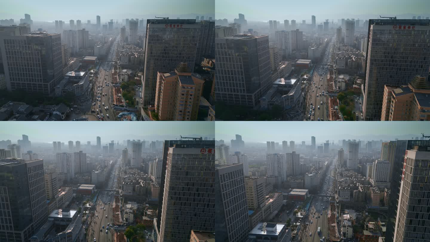 云南旅游昆明市中心雾气笼罩金碧路街景