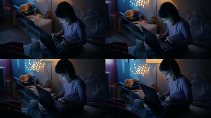 聪明的年轻女孩在深夜的卧室里坐在她的床上，用笔记本电脑打字一些有趣的东西。她的夜灯亮着。