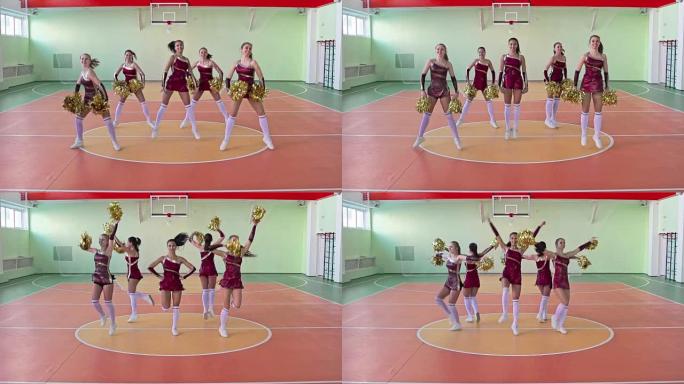 一群啦啦队在学校体育馆跳舞