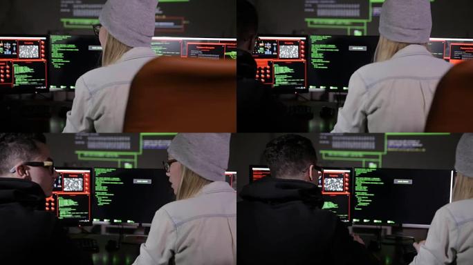 试图访问计算机系统的年轻男女黑客