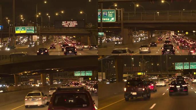 FPV: 夜间沿着芝加哥市繁忙的多车道高速公路行驶