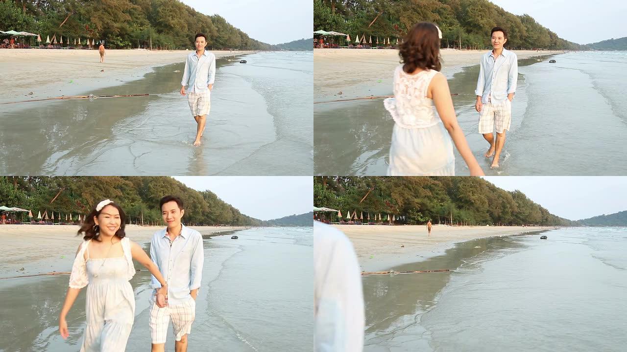 Dolly Shot:浪漫情侣在海滩日落时散步