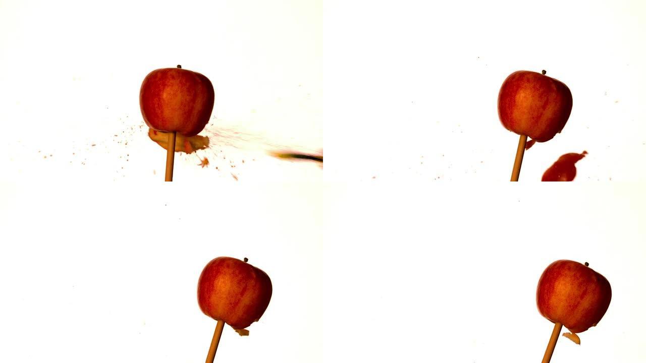 箭头射穿白色背景的红苹果