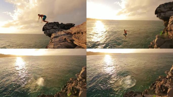 夏季极限运动悬崖跳跃户外生活方式。日落时跳崖。