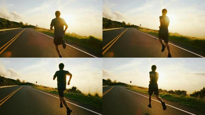 运动男子在日落时奔跑