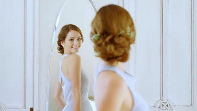 华丽的新娘在镜子里检查自己4K 4k