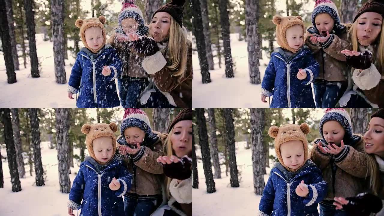 小孩和妈妈在寒假玩雪