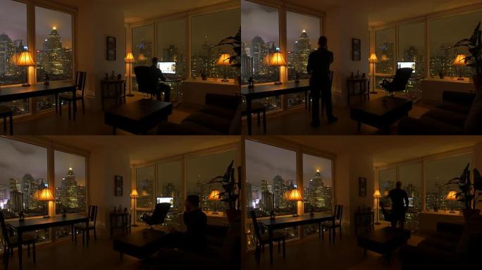 高层公寓阁楼晚上的壮丽景色。城市生活方式背景。