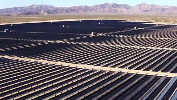 飞越沙漠中大型工业太阳能农场的鸟瞰图