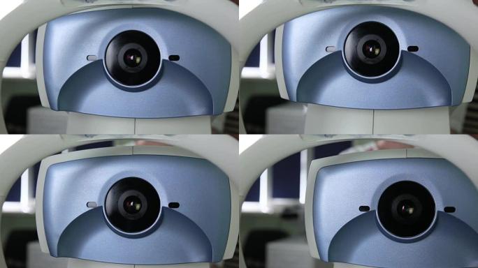 现代自动医疗机器检查眼球。专业医疗设备屏幕上的眼科检查测试