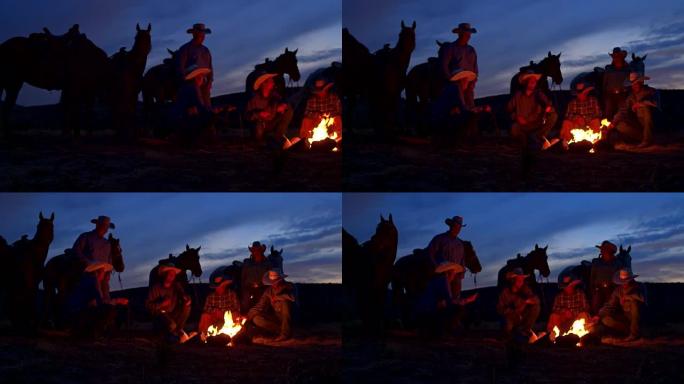 在美国犹他州的篝火上平移一群牛仔的视频