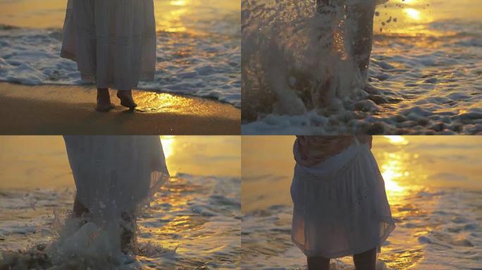 一个穿白色裙子的女人从海浪中反弹。日落之光。慢动作镜头。4K, UHD