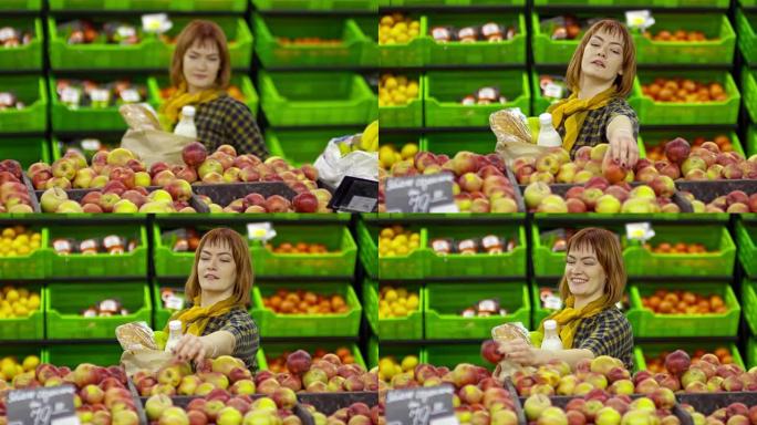 坐在轮椅上的女人在杂货店买苹果