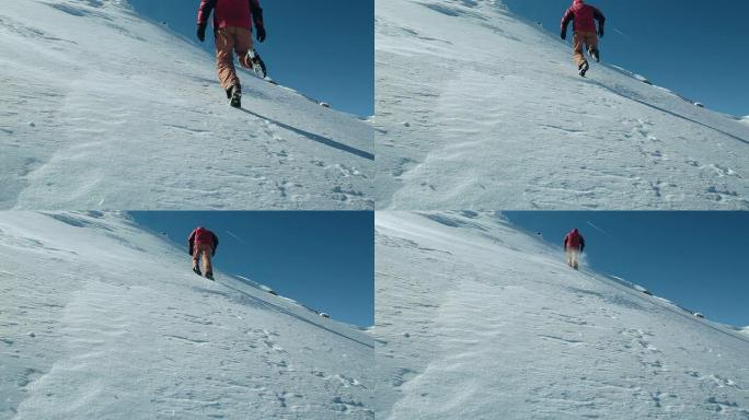 一个人在冰川上上坡。