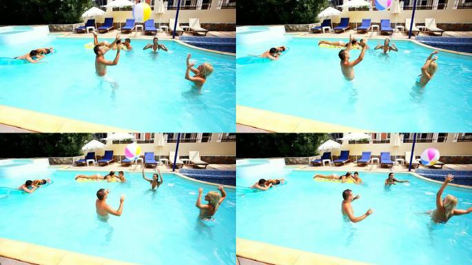 年轻人在游泳池里嬉戏。