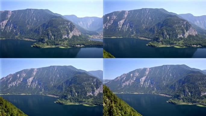 平移镜头: 奥地利哈尔施塔特村和湖的鸟瞰图