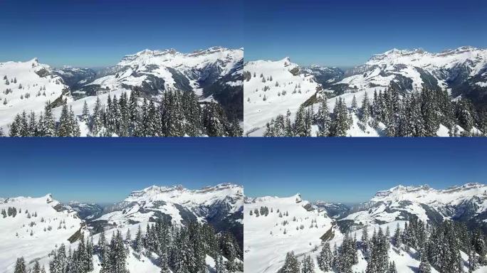 Aerial view of snow covered mountain range with be