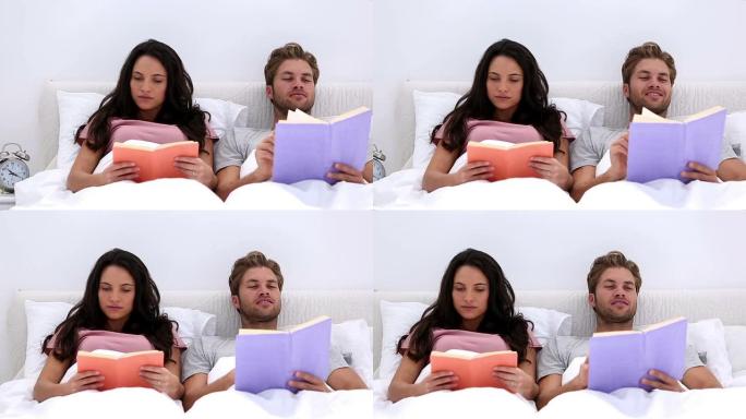 夫妇阅读书籍