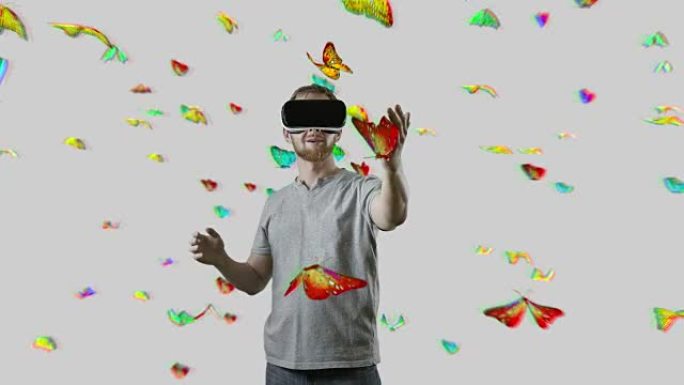 蝴蝶云互动触摸虚拟蝴蝶白色带VR齿轮眼镜的人