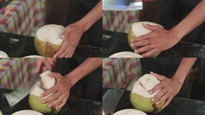 用刀剁碎椰子，泰国街头美食