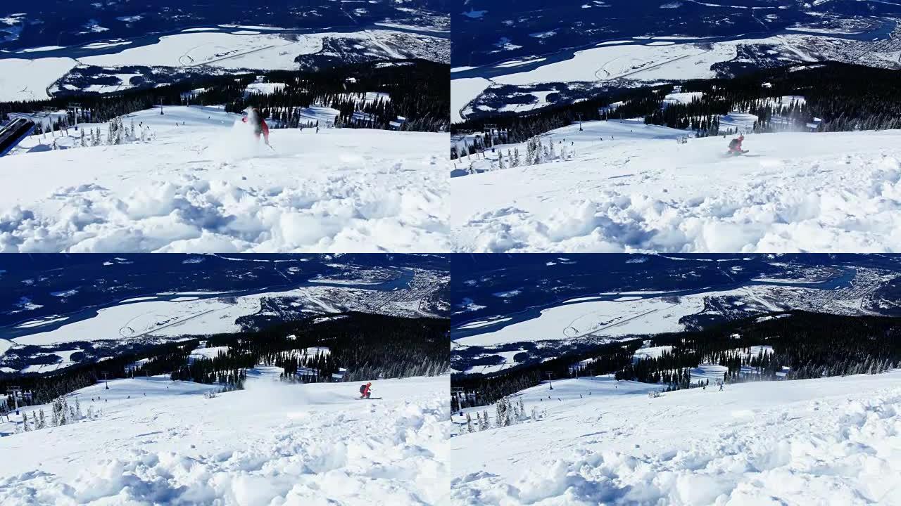 雪山上的人滑雪板