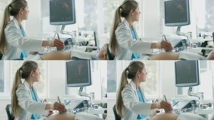 在医院，产科医生使用换能器进行超声/超声检查/扫描孕妇的腹部。电脑屏幕显示健康成形婴儿的3D图像。