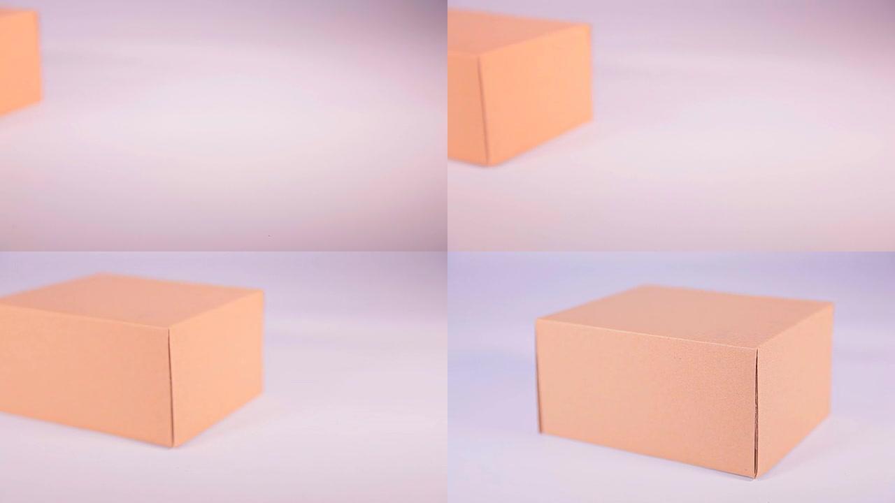 高清多莉: 白色背景上的棕色纸盒。