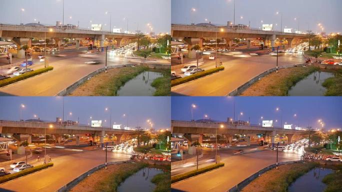 4k时间流逝: 泰国夜间城市十字路口的交通，Muang Thong Thani。