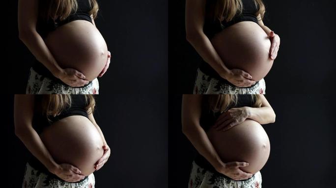 怀孕待产新生命孕妇摸肚子