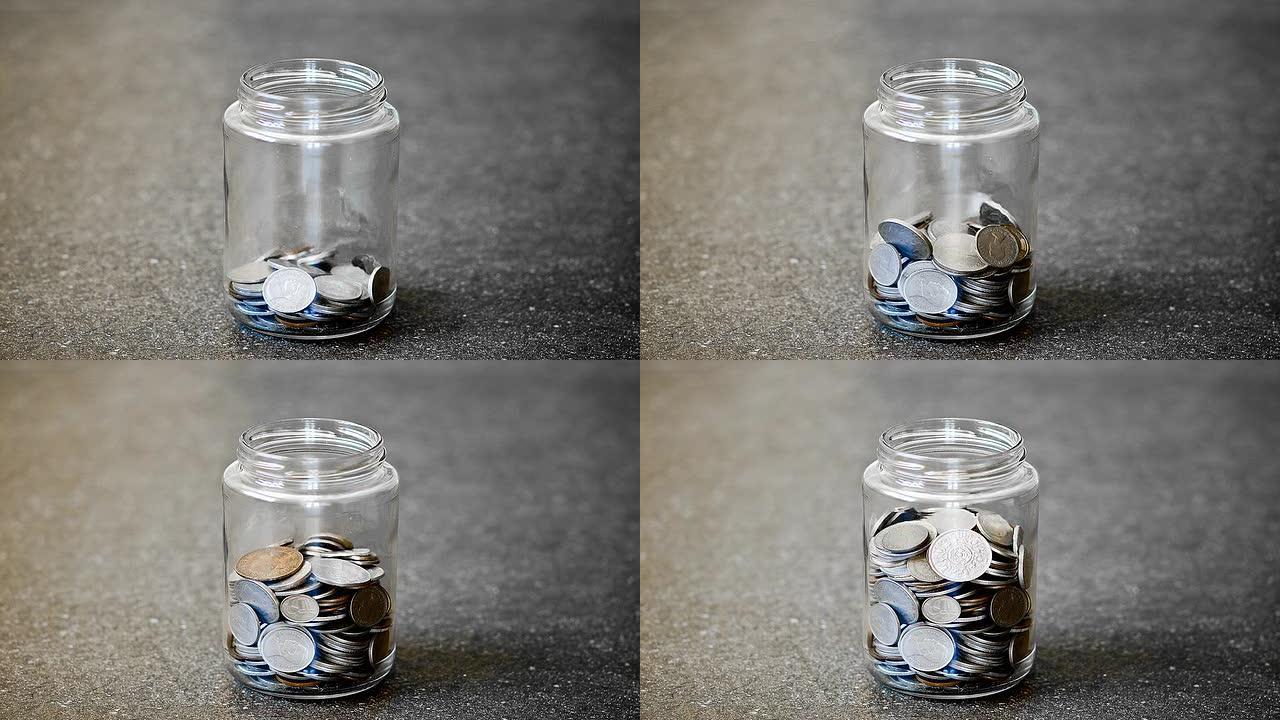 停止装满硬币的玻璃罐的运动