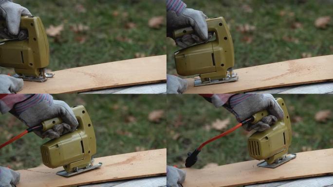用电动竖锯在木头上切割图案