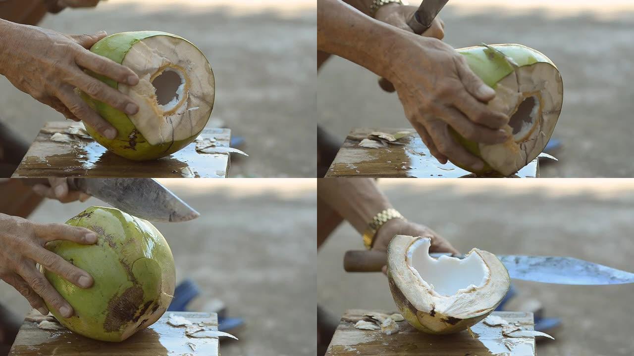 用大砍刀折断椰子用大砍刀折断椰子