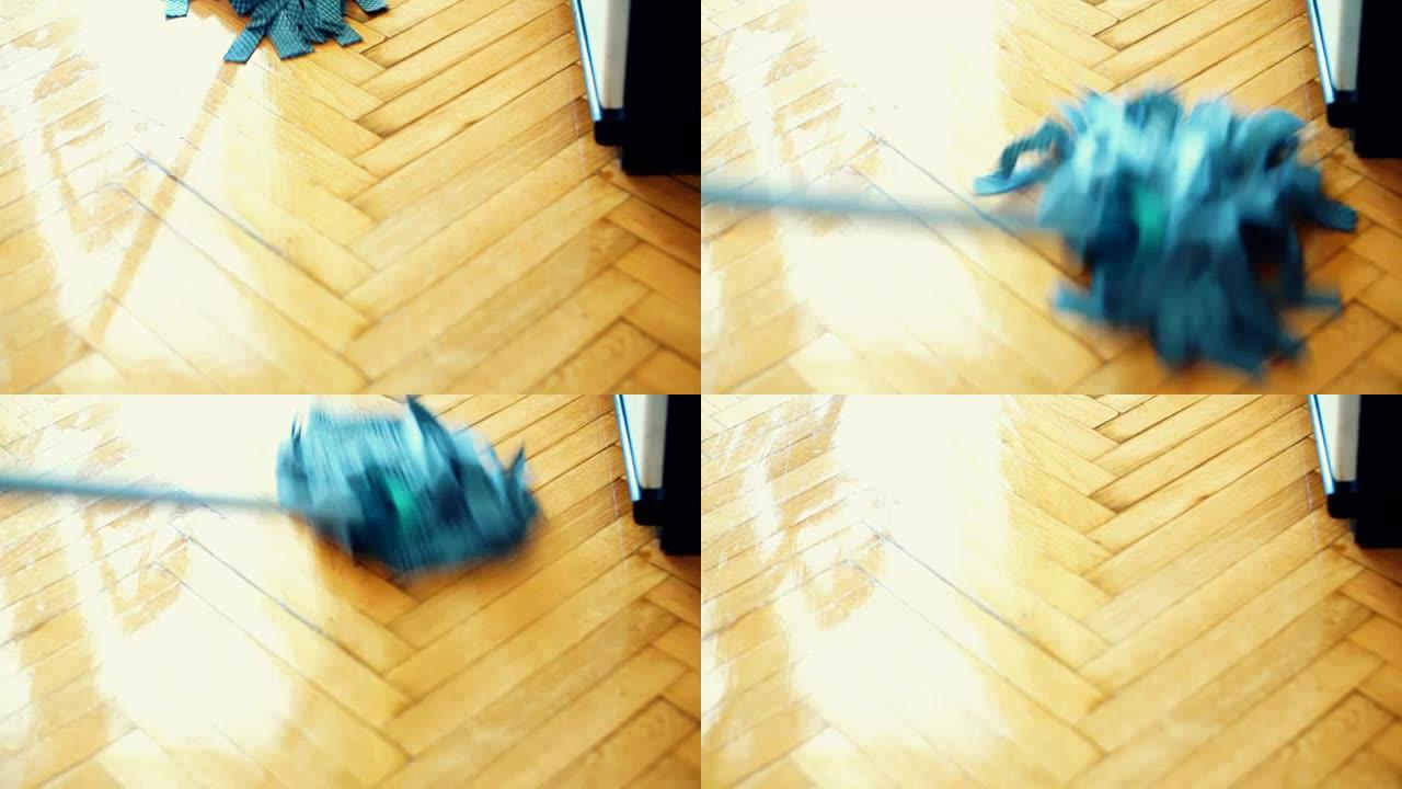 用拖把清洁地板。打扫拖地保洁