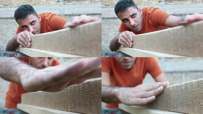 用砂纸打磨木板木工