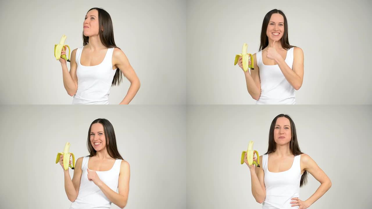 年轻漂亮的女人吃香蕉并露出大拇指