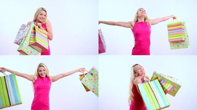 年轻漂亮的金发女人，带购物袋