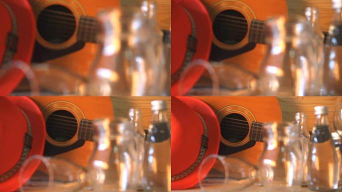 玻璃饮料和原声吉他。