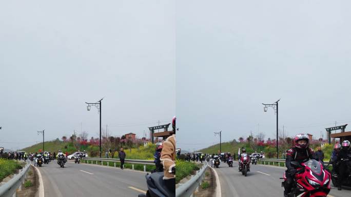 机车摩托车队行驶在乡村道路交通田园风光