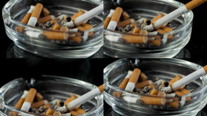 高清超级慢动作: 烟灰缸里的香烟